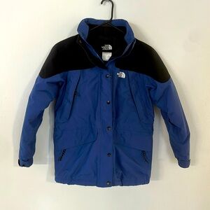 The North Face women’s small parka blue and black.  Very warm